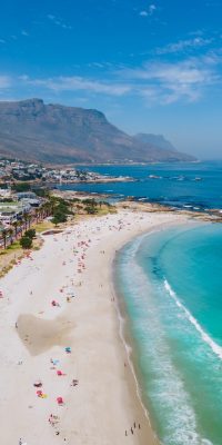 View from The Rock viewpoint in Cape Town over Campsbay, view over Camps Bay with fog over the ocean. fog coming in from ocean at Camps Bay Cape Town